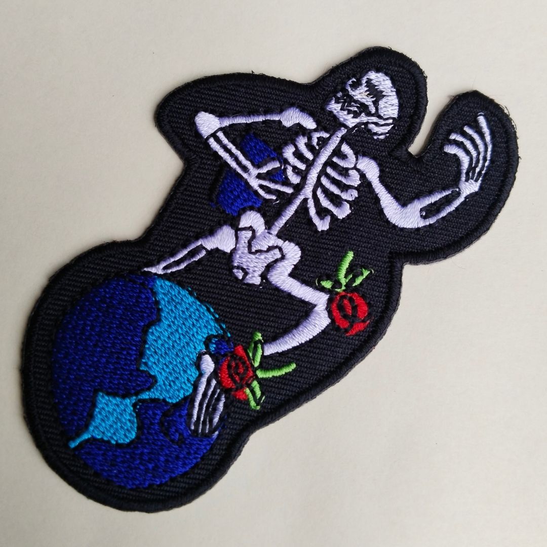 Skeleton on Earth Globe Iron-On Patch