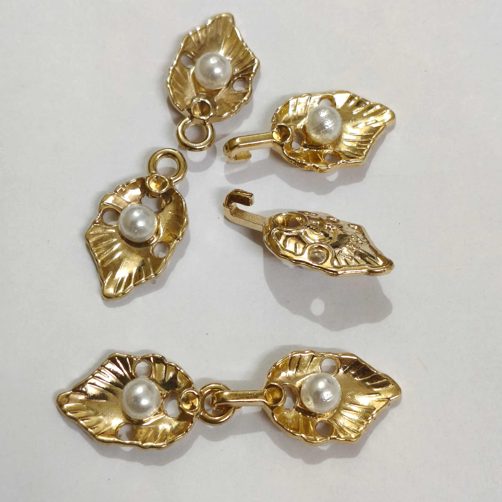 Gold pearl frog fastener on sherwani blazer fabric styling – Gleemify