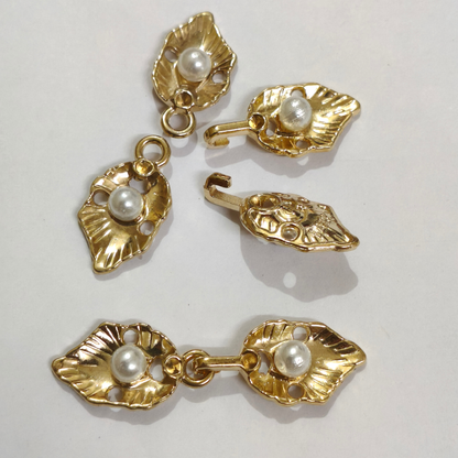 Gold pearl frog fastener on sherwani blazer fabric styling – Gleemify