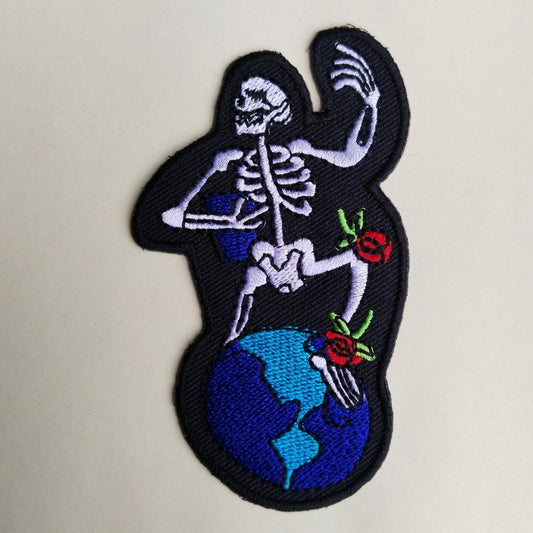 Skeleton on Earth Globe Iron-On Patch