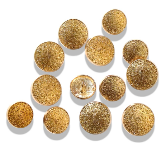 Gold embossed floral scroll buttons close-up detail India – Gleemify