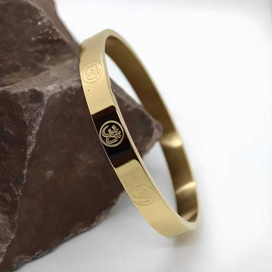 Carved Om Gold Plated Bracelet with Elegant Design and Symbolic Om Engravings