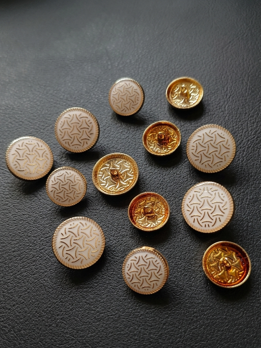 A 12pc set of Gleemify decorative buttons for sport coats and jackets, including large and small vintage-style gold buttons on a dark grey background.