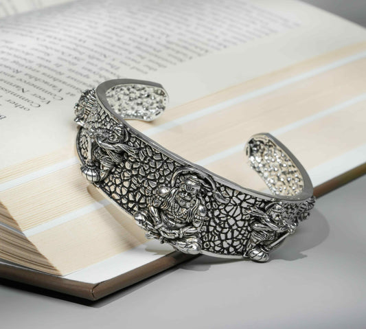 Elegant Hanumanji Kada Bracelet intricately designed with detailed carvings on a silver cuff