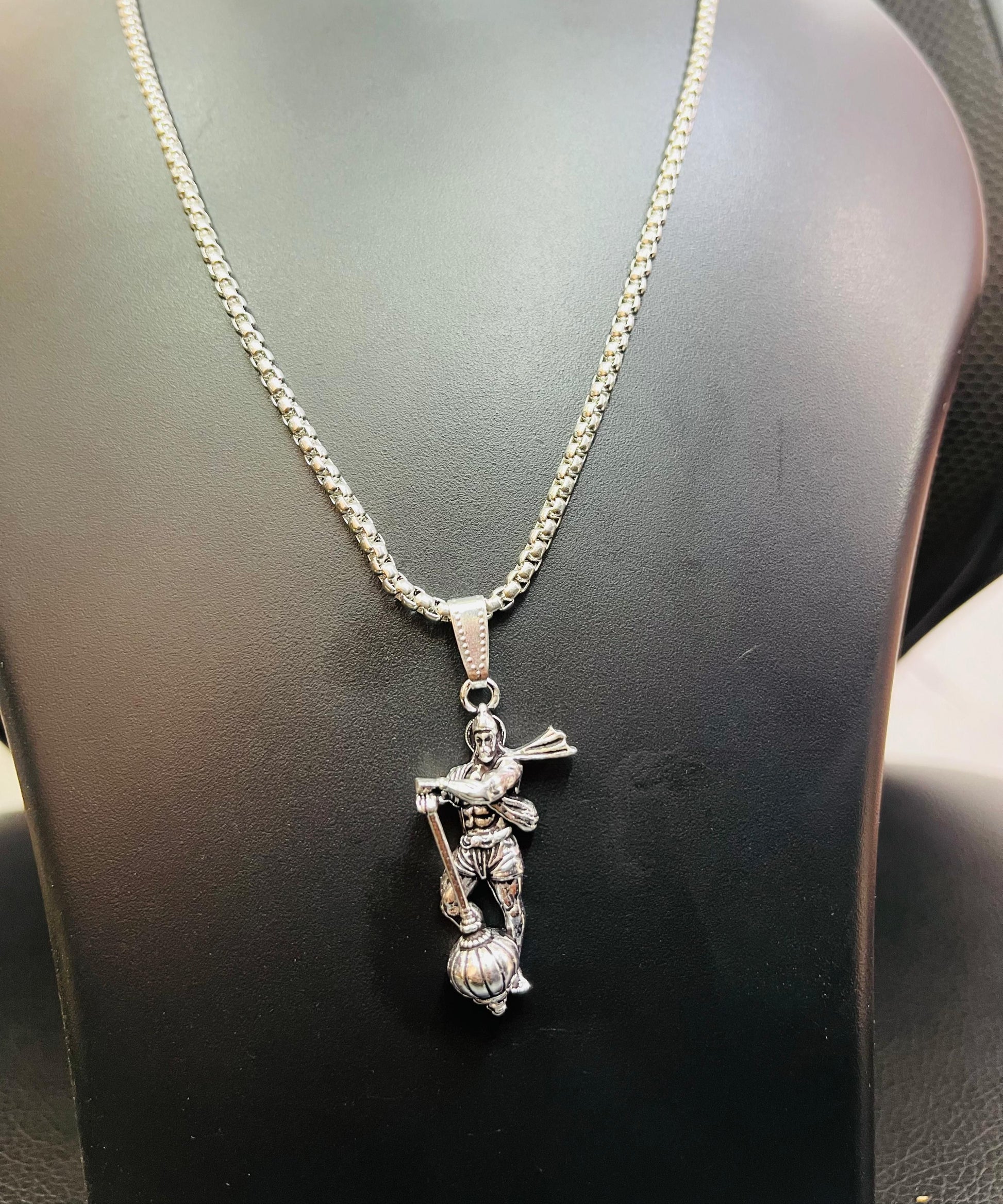 Hanumanji pendant with gada on a silver chain, showcasing intricate detailing and craftsmanship