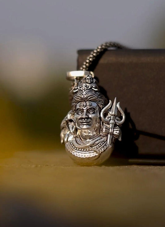 Intricate Mahadev pendant necklace featuring Lord Shiva with a trident design in silver finish